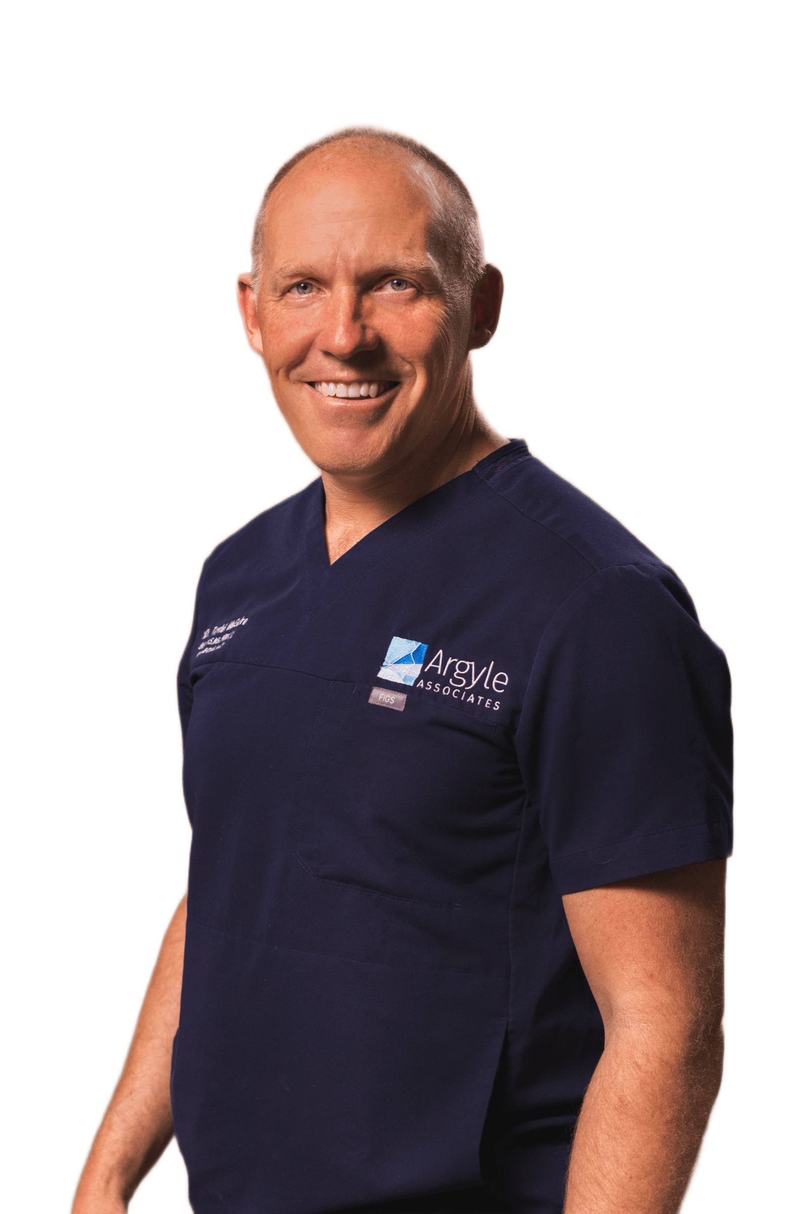 Dr. Taylor McGuire, oral & maxillofacial surgeon, in Argyle Associates scrubs